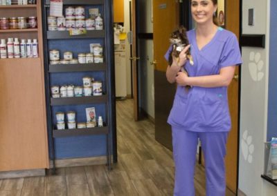 Mauer Animal Clinic vet tech with small dog